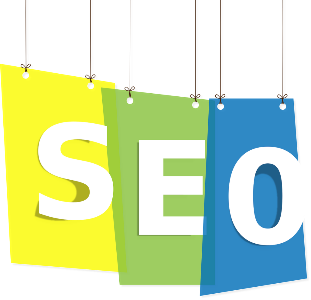 Block letters with yellow, green, and blue and squares hanging from the top with SEO